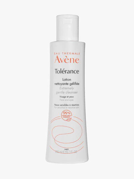 Eau Thermale Avène Tolérance Extremely Gentle Cleanser in branded white bottle with cap on light gray background
